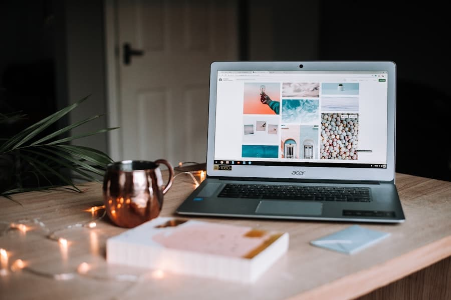 Laptop screen displaying a grid of photo thumbnails in a cozy home workspace